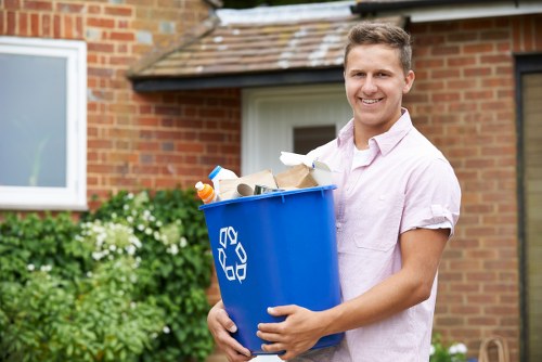 Team measuring cubic yards of waste at a mixed-use office block